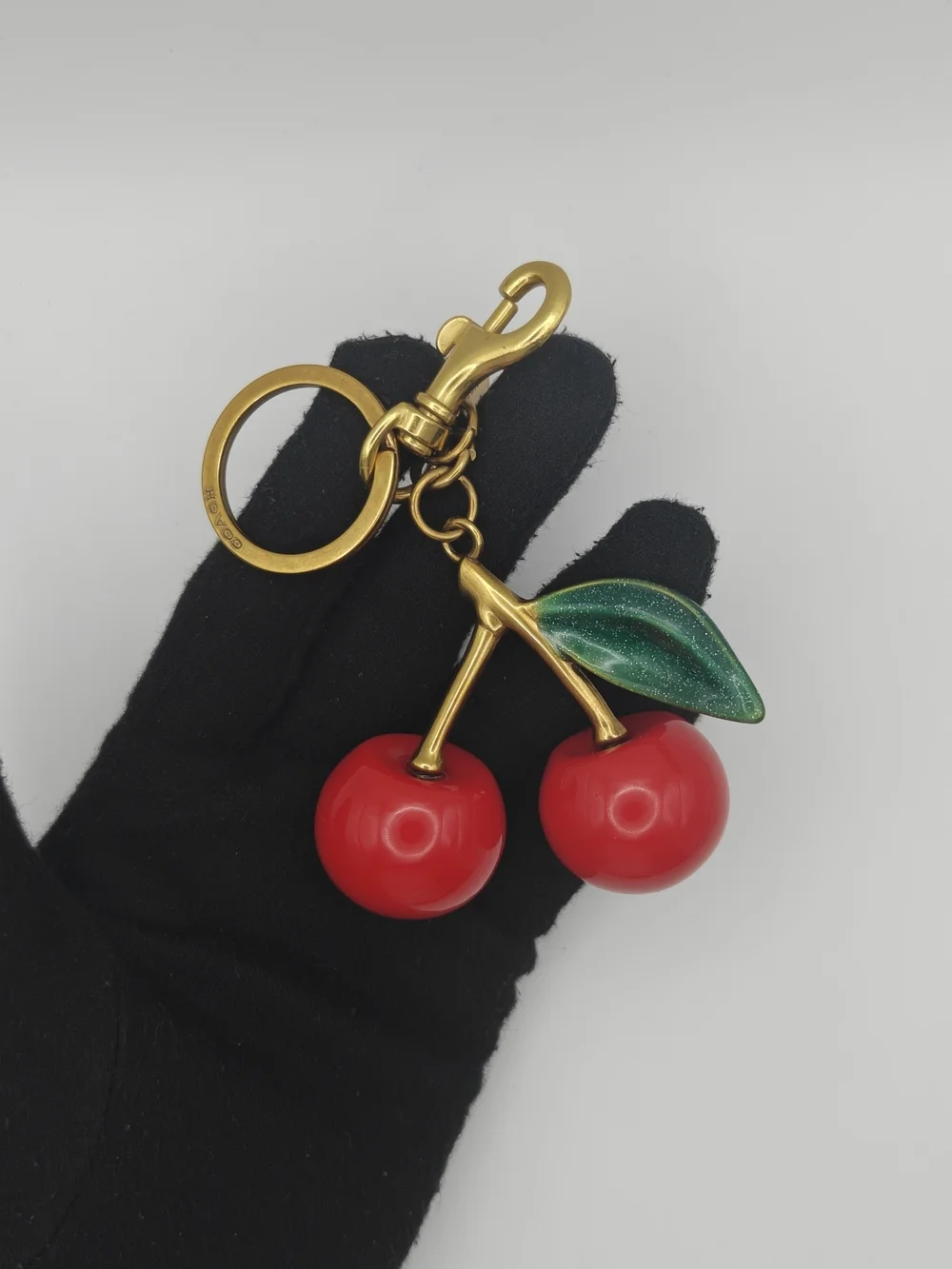 Coach Red Cherry Bag Charm Keychain with Green Leaf and Gold Hardware